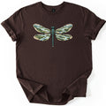 Braided River Dragonfly Comfort Colors T-shirt in Dark Chocolate, laid flat. A teal dragonfly with outspread wings, each wing filled with a scene of braided blue river channels, green forests and distant hills. No words. Sleeves are cuffed, shown on a white background.