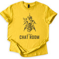 My Kind Of Chat Room Comfort Colors T-shirt in Daisy, laid flat. A sketch of chickadees and sparrows perched around a hanging tube bird feeder, one upside down below spilling seeds, above the words My Kind Of Chat Room in dark gray. Sleeves rolled, on a white background.