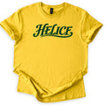 Helice Comfort Colors T-shirt in Daisy, laid flat. The word Helice is printed across the chest in dark green retro script with a swooping underline tail. The shirt lies on a white background with its sleeves cuffed and the hem loosely folded.