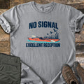 Excellent Reception Comfort Colors T-shirt in Grey, laid flat. The words No Signal arch over an orange kayak with a paddle among reeds and flying birds, above the words Excellent Reception. Olive pants and brown hiking boots sit on a weathered wood surface.