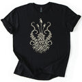 Moss Woodcut Comfort Colors T-shirt in Black, laid flat. A cream woodcut-style illustration of a moss clump with roots, spiky leaves, curling side fronds and three tall stalks topped with spore capsules. The sleeves are rolled, on a white background.