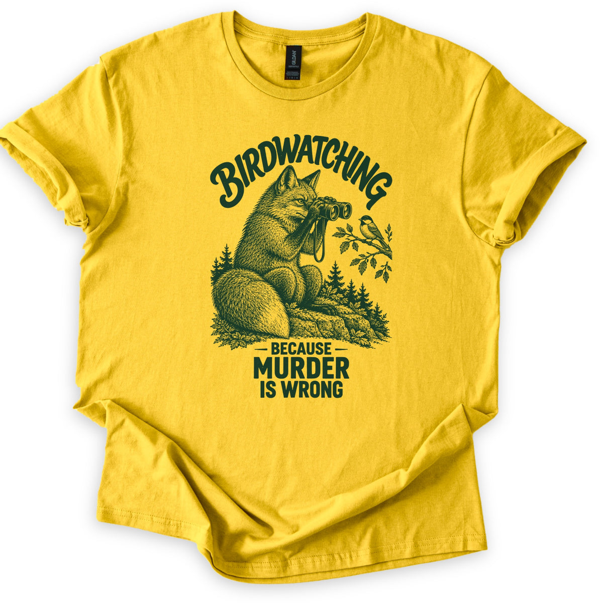 Birdwatching Murder Fox Comfort Colors T-shirt in Daisy, laid flat. A sketched fox sits on a rock peering through binoculars at a chickadee on a branch, with Birdwatching arched above and Because Murder Is Wrong below, in dark green ink. On a white surface, sleeves cuffed.