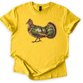 Ruffed Grouse Woods Comfort Colors T-shirt in Daisy, laid flat. A walking ruffed grouse with a crested head and barred brown feathers, its body and fanned tail filled with a forest scene of trees, ferns and a dirt path. No words. Sleeves rolled, on a white background.