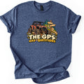 The GPS Has Questions Comfort Colors T-shirt in Heather Navy, laid flat. A muddy orange off-road side-by side sits on a dirt trail with rocks, pine trees and a wooden signpost above the words The GPS Has Questions. The shirt has rolled sleeves on a white background.