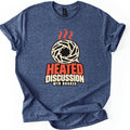 Heated Discussion MTB Brakes Comfort Colors T-shirt in Heather Navy, laid flat. A slotted bike brake rotor shaped like a speech bubble, with red steam lines rising above it, over the words HEATED DISCUSSION MTB BRAKES. The shirt has rolled sleeves on a white background.