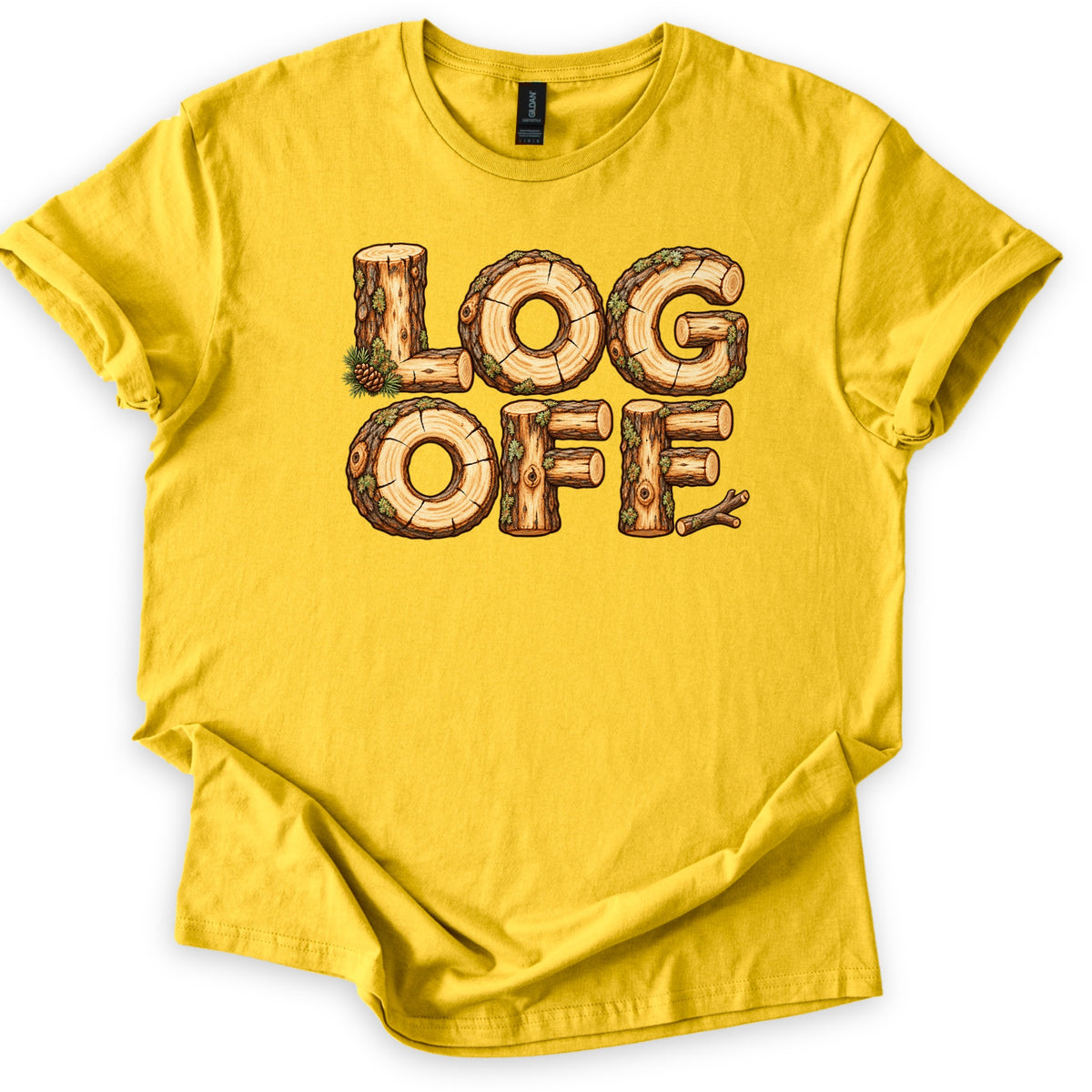 Log Off Comfort Colors T-shirt in Daisy, laid flat. The words LOG OFF are spelled in letters made of cut logs with bark, moss and tree rings, with a pine sprig and cone by the L and a twig after the last F. Sleeves are rolled on a white background.