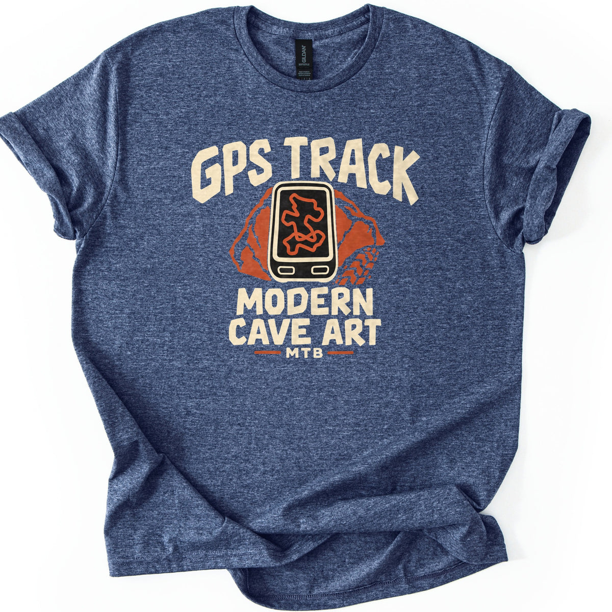 GPS Track Modern Cave Art Comfort Colors T-shirt in Heather Navy, laid flat. A bike GPS unit showing a squiggly orange route sits before orange rocks and a tire track, under the words GPS Track and above Modern Cave Art and MTB. Sleeves are cuffed on a white background.