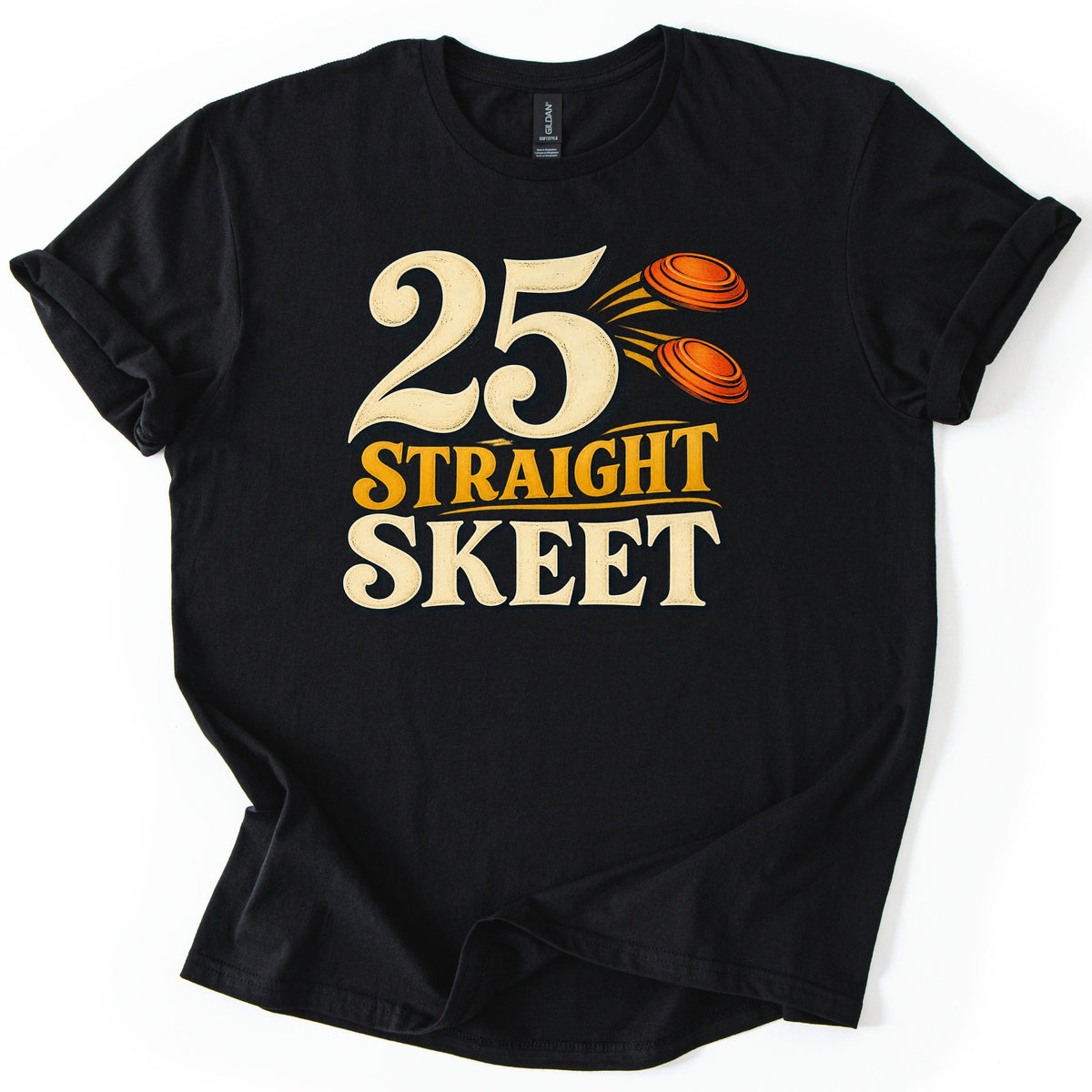 25 Straight Skeet Comfort Colors T-shirt in Black, laid flat. Large cream numbers 25 with two orange clay targets flying beside them, above the words Straight Skeet in gold and cream lettering. The shirt has rolled sleeves on a white background.