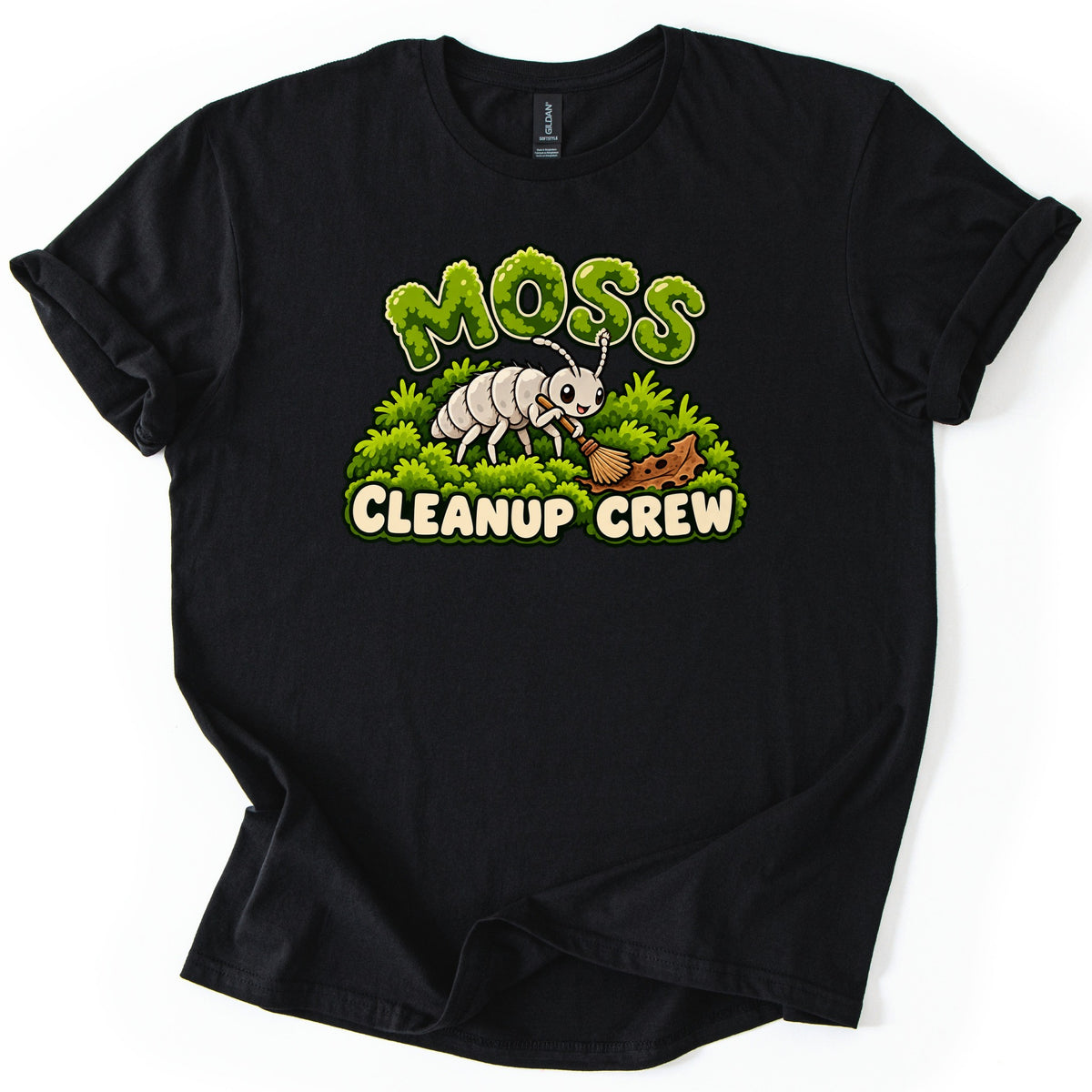 Moss Cleanup Crew Comfort Colors T-shirt in Black, laid flat. The word MOSS in green mossy letters tops a smiling white cartoon bug sweeping brown debris off a mound of moss with a broom, above the words CLEANUP CREW. Cuffed sleeves, on a white background.