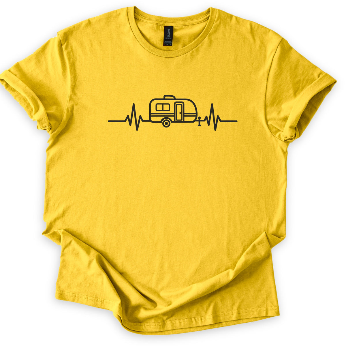 Camper Heartbeat Comfort Colors T-shirt in Daisy, laid flat. A black line drawing of a small camper trailer with a window, door, wheel and hitch jack sits in the middle of a heartbeat line across the chest, with no words. The sleeves are cuffed on a white background.