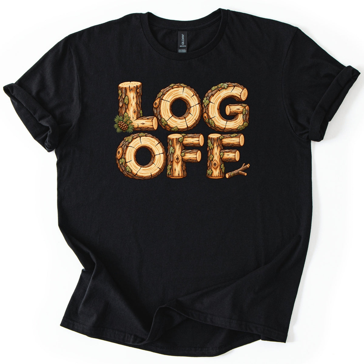 Log Off Comfort Colors T-shirt in Black, laid flat. The words LOG OFF are spelled in letters made of cut logs with bark, moss and tree rings, with a pine sprig and cone by the L and a twig after the last F. Sleeves are rolled on a white background.