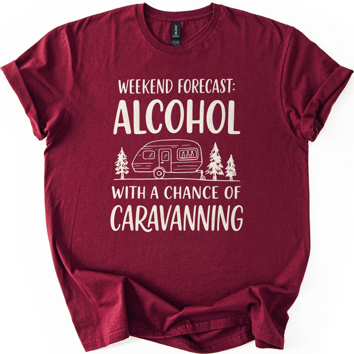 Weekend Forecast Caravanning Comfort Colors T-shirt in Maroon, laid flat. Cream print reads Weekend Forecast: Alcohol With a Chance of Caravanning around a line drawing of a caravan with bottles in its window between pine trees. Sleeves are cuffed on a white background.