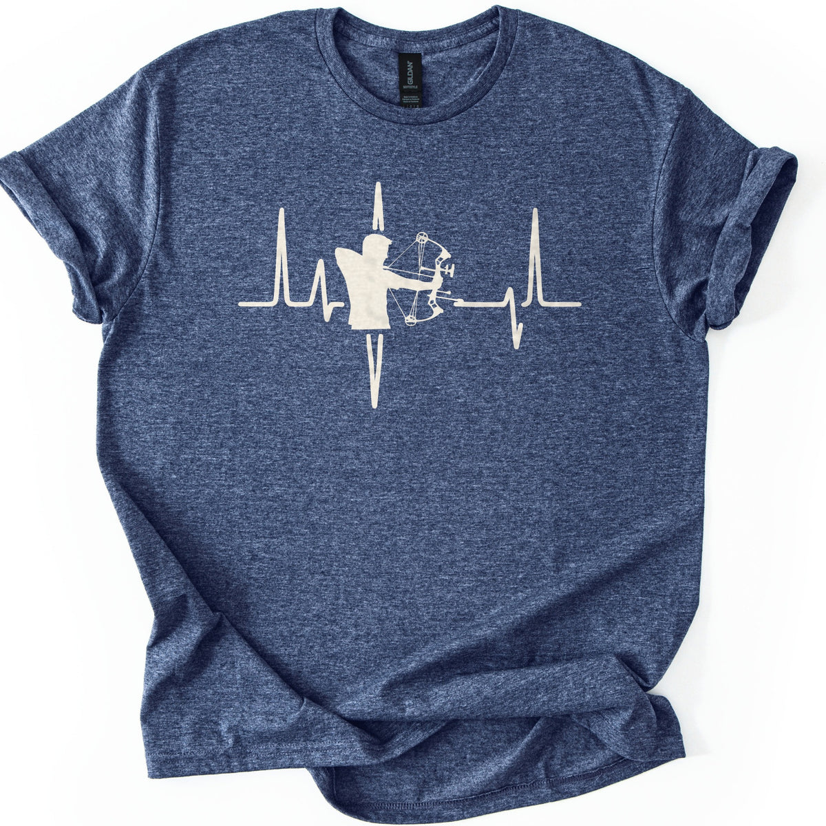 Compound Bow Archer Comfort Colors T-shirt in Heather Navy, laid flat. A cream silhouette of an archer drawing a compound bow sits in the middle of a heartbeat line across the chest, with no words. The shirt lies on a white background with its sleeves cuffed.