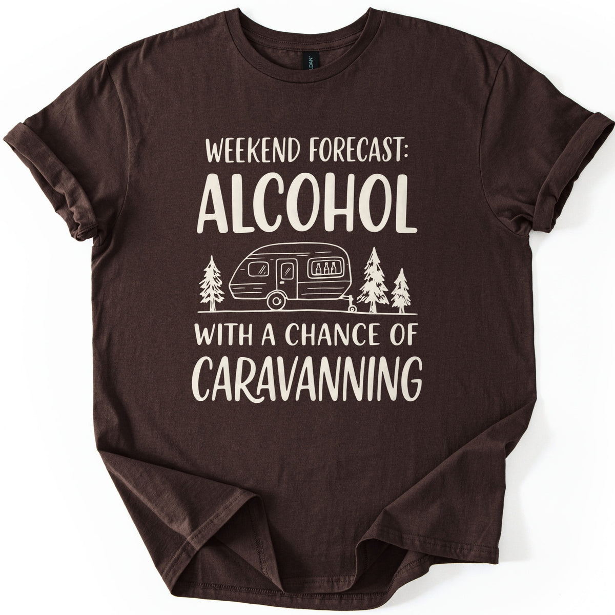 Weekend Forecast Caravanning Comfort Colors T-shirt in Dark Chocolate, laid flat. Cream print reads Weekend Forecast: Alcohol With a Chance of Caravanning around a line drawing of a caravan with bottles in its window between pine trees. Sleeves are cuffed on a white background.